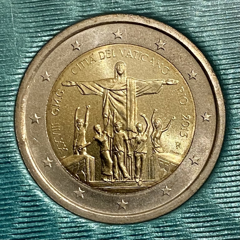 Монета 2 евро 2013 год.Всемирный день католической молодежи в Рио-де-Жанейро.Ватикан.В буклете.